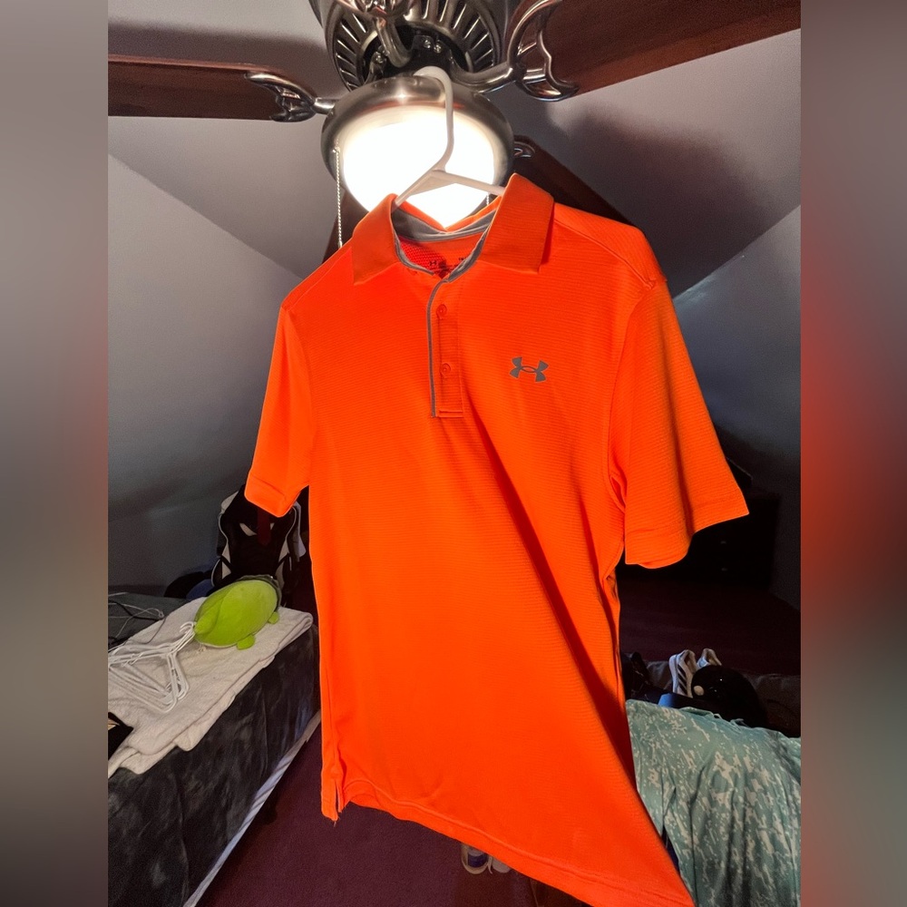 Orange Under Armor golf shirt